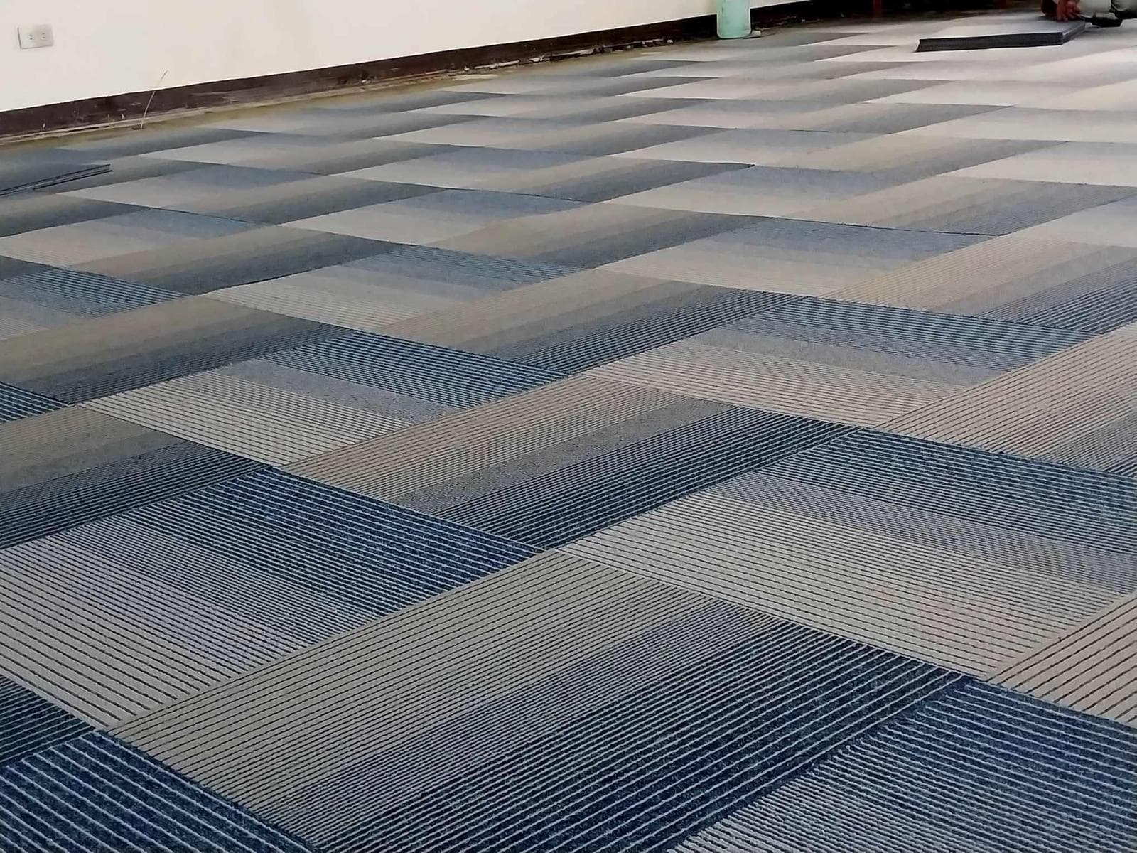 Commercial carpet tile installation in an open plan office